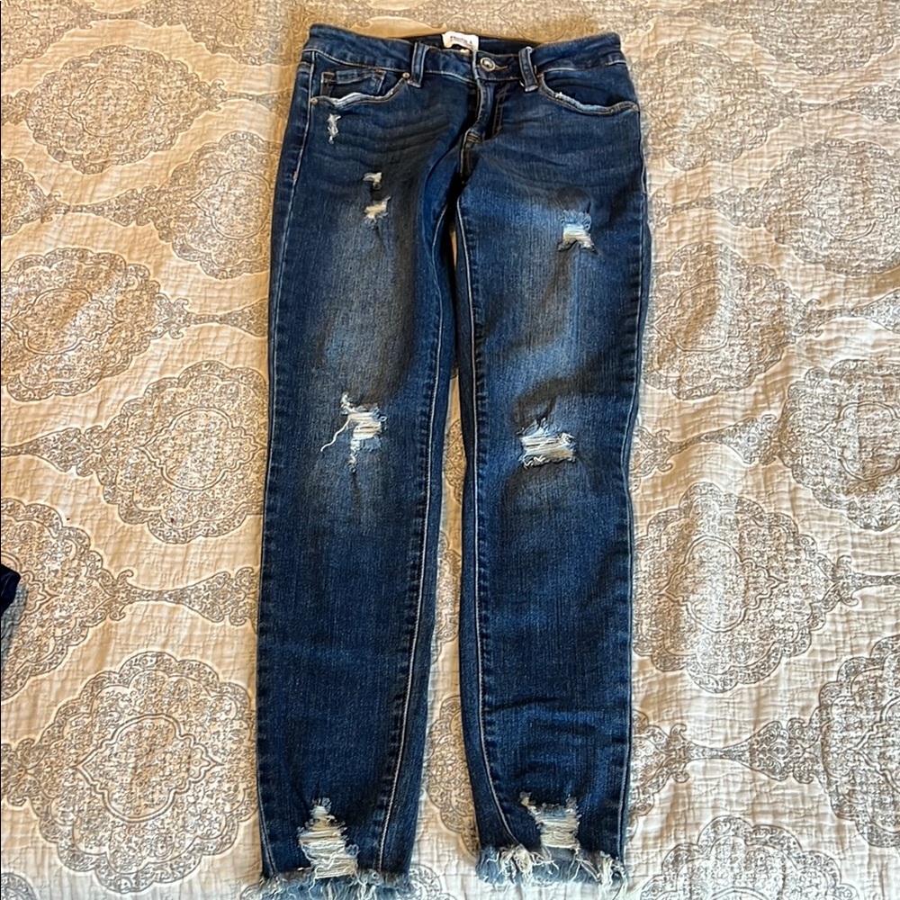 Distressed Blue Jeans